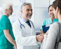 confident-doctor-shaking-patient-s-hand-1024x768